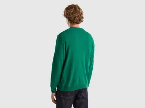 Green crew neck sweater in pure Merino wool - Dark Green | Benetton