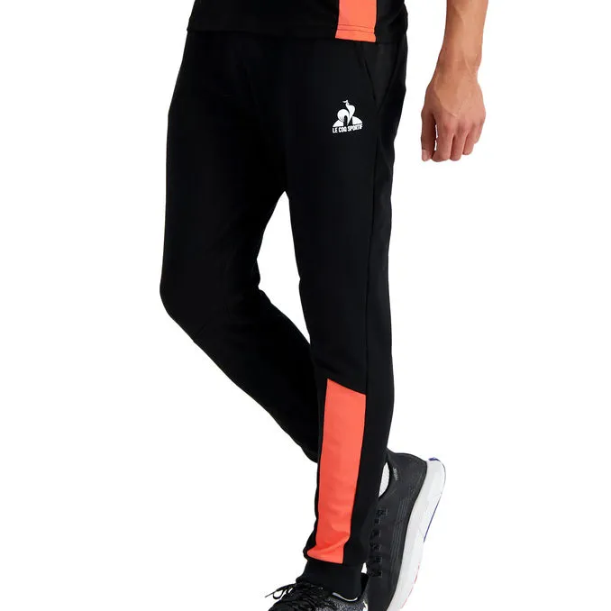 JOGGERS TRAINING PERFORMANCE Man Black Orange