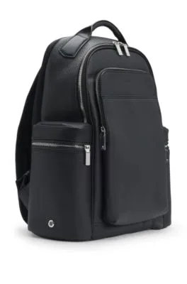 Multi-pocket backpack in Italian leather with signature trims